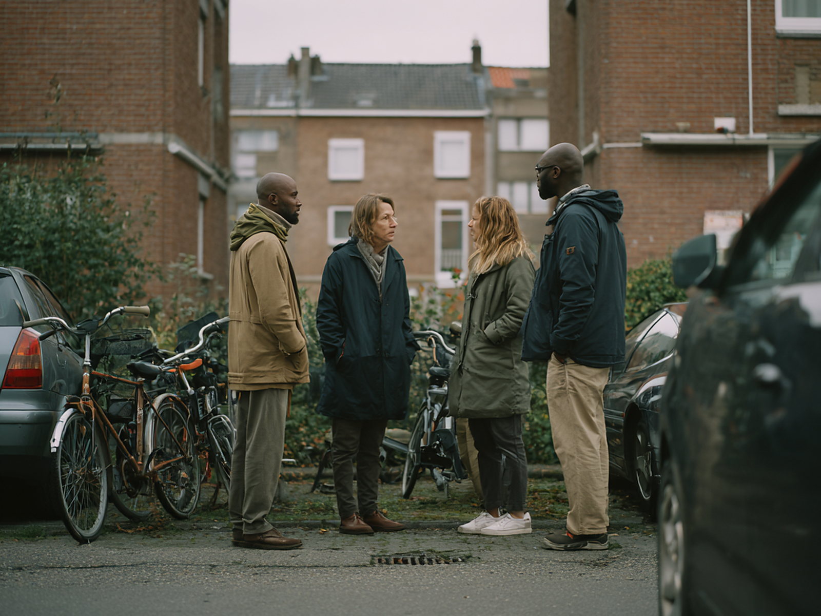 Neighbors talking together outdoors
